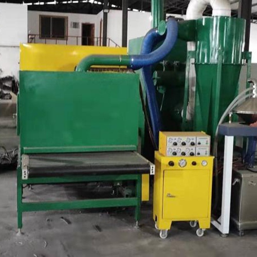 Línea automática de pulverización electrostática de pastillas de freno.